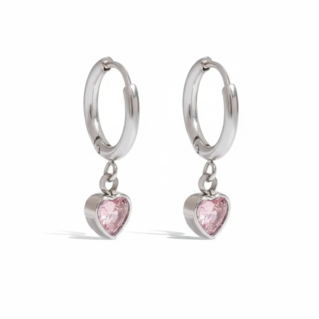 Koop verzilverde roze druppelvormige huggie oorringen voor dames. Waterdichte, hypoallergene, vlekvrije roestvrijstalen sieraden voor dagelijks gebruik.