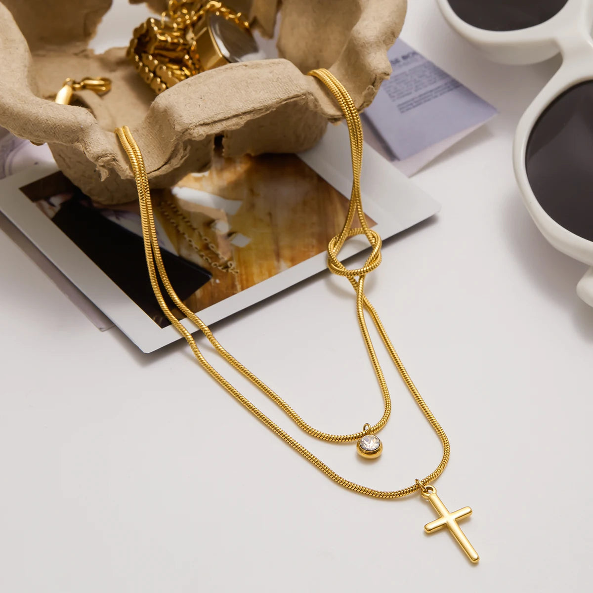 Gelaagde Gouden Kruisketting | Slangenketting Knoop & Solitaire Druppel