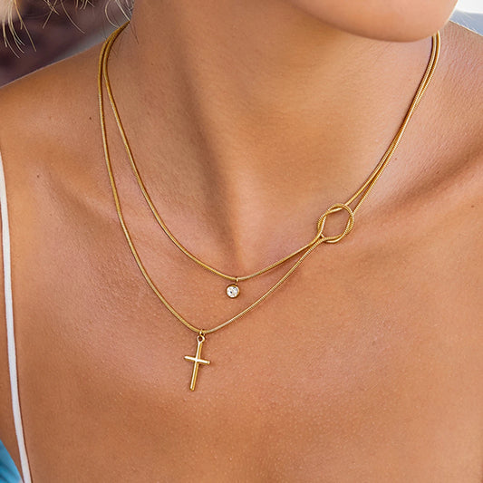 Gelaagde Gouden Kruisketting | Slangenketting Knoop & Solitaire Druppel