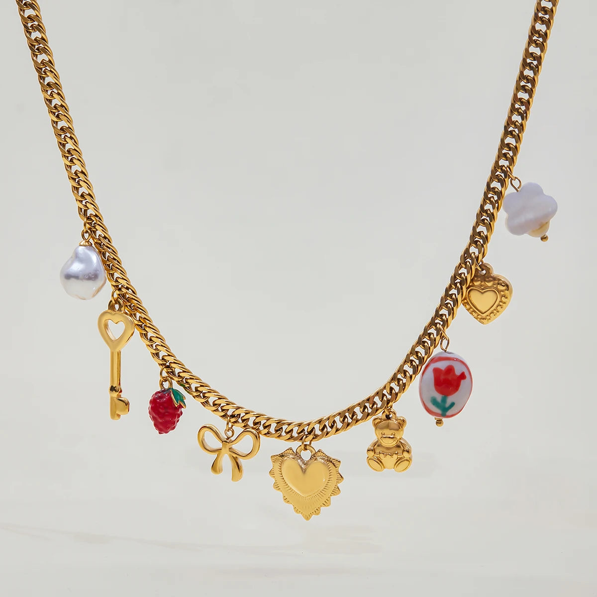 Goudkleurige Charmeketting voor Dames – Dikke Ketting met Hart-, Parel- & Teddybedel