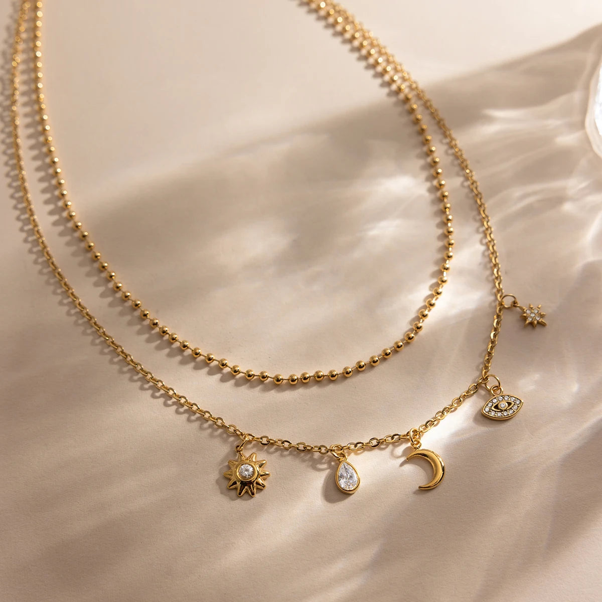 18K vergulde hemelse dubbellaagse bedelketting | Waterdichte zon maan ster en boze oog gelaagde ketting | Boho gouden bedelketting set