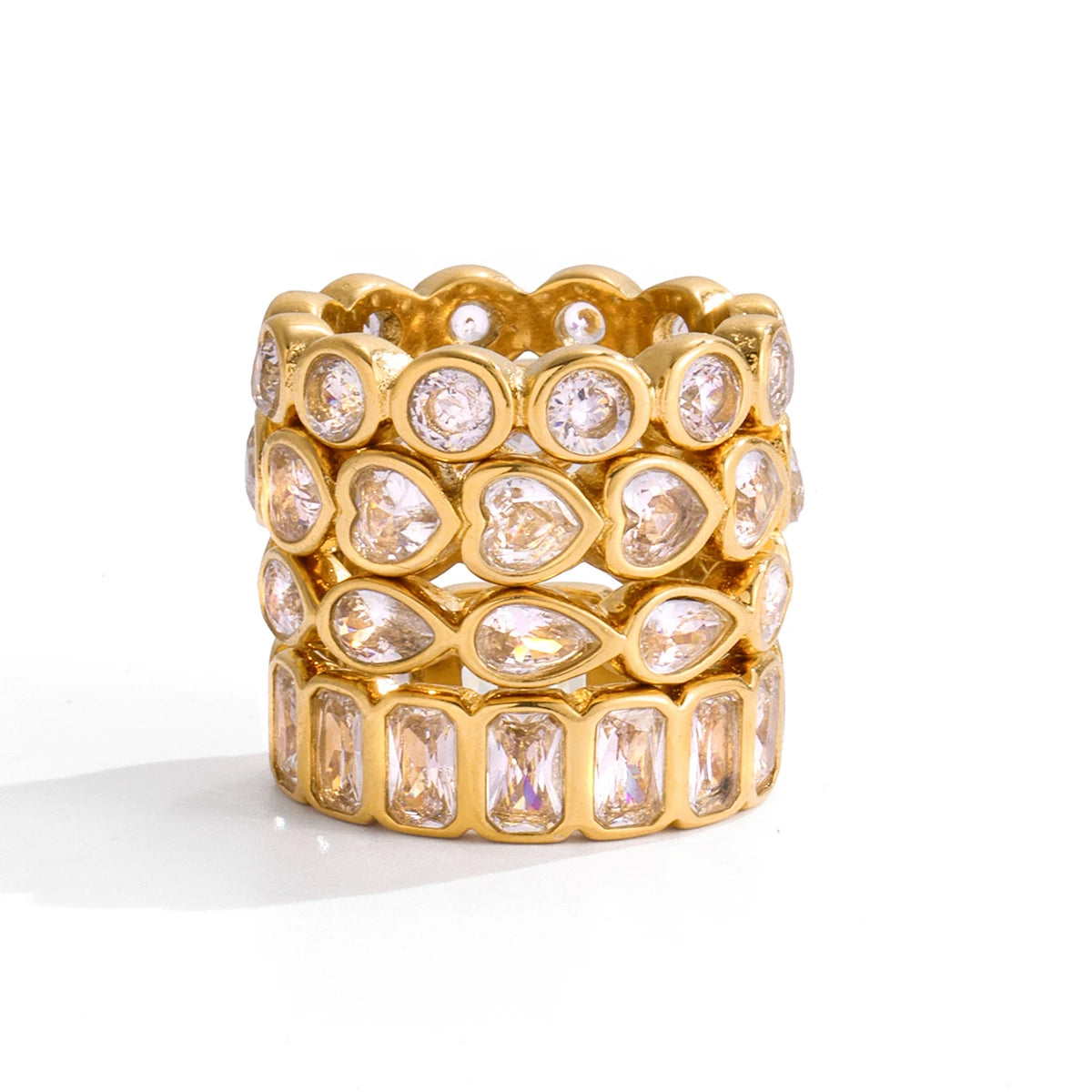 Luxury Gold Stacked Ring Set – Multi-Shape Crystal Bands (Heart, Round, Teardrop, Baguette)