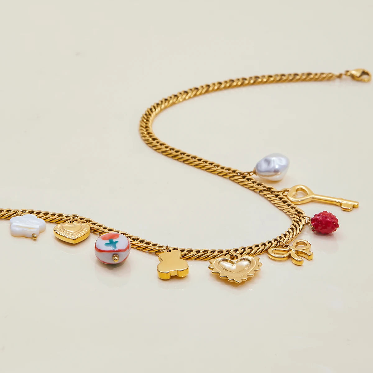 Goudkleurige Charmeketting voor Dames – Dikke Ketting met Hart-, Parel- & Teddybedel
