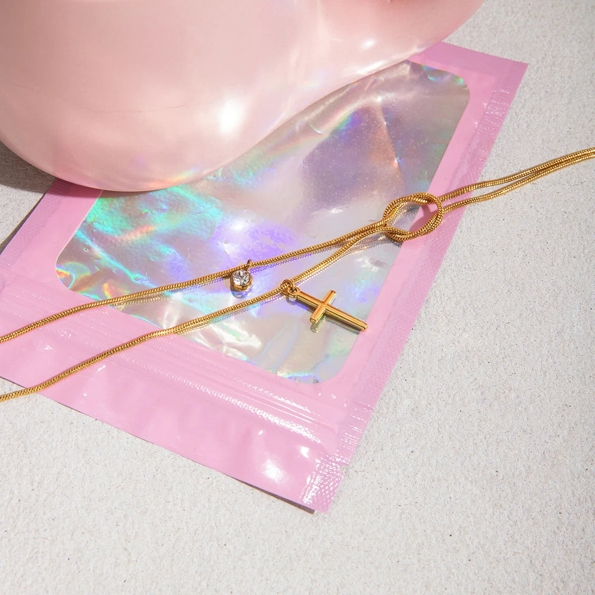 Gelaagde Gouden Kruisketting | Slangenketting Knoop & Solitaire Druppel