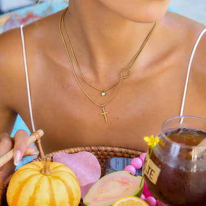 Gelaagde Gouden Kruisketting | Slangenketting Knoop & Solitaire Druppel
