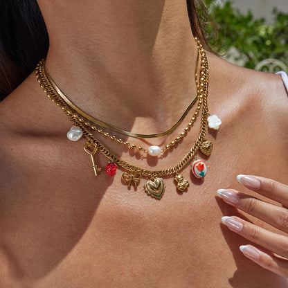 Goudkleurige Charmeketting voor Dames – Dikke Ketting met Hart-, Parel- & Teddybedel