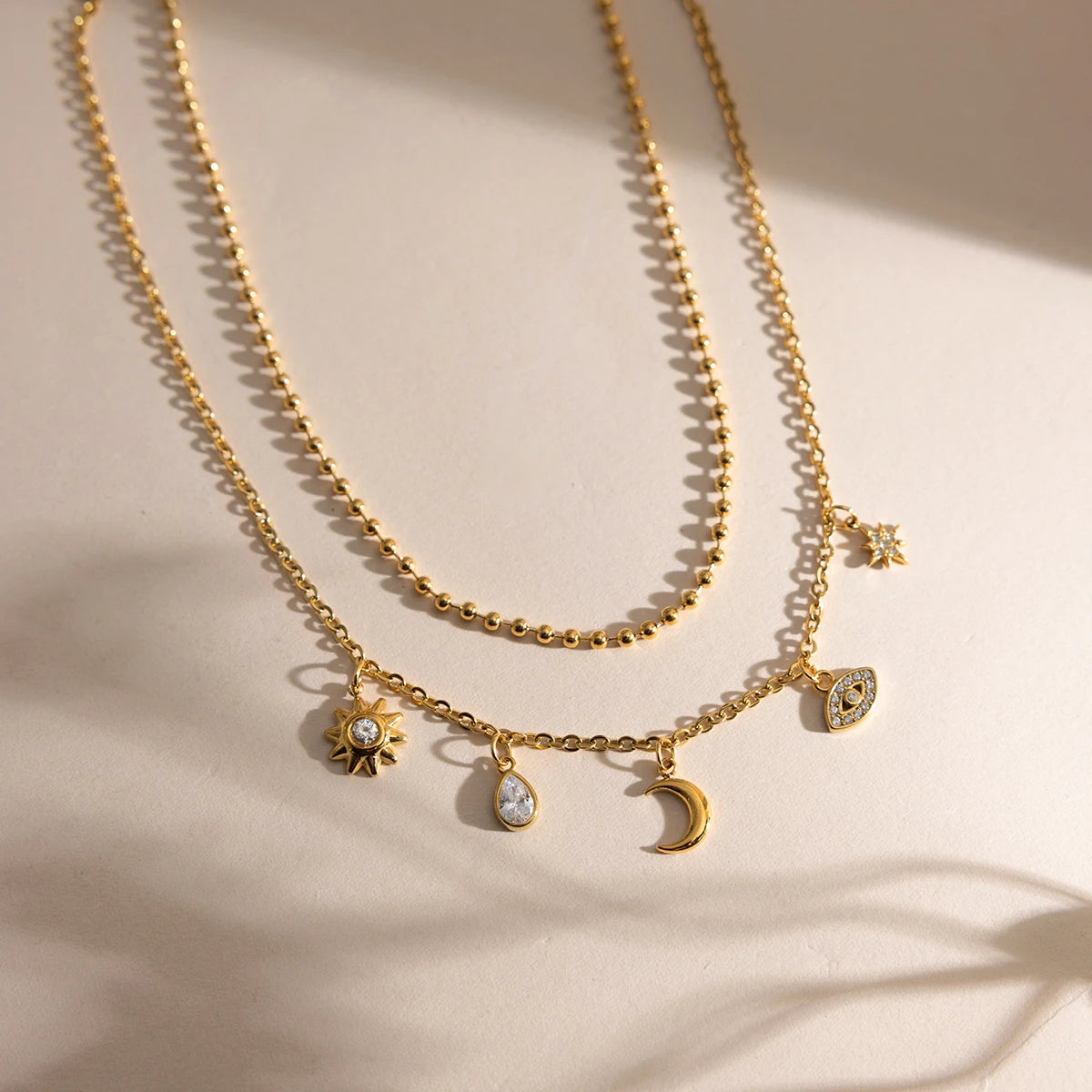 18K vergulde hemelse dubbellaagse bedelketting | Waterdichte zon maan ster en boze oog gelaagde ketting | Boho gouden bedelketting set
