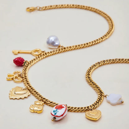 Goudkleurige Charmeketting voor Dames – Dikke Ketting met Hart-, Parel- & Teddybedel